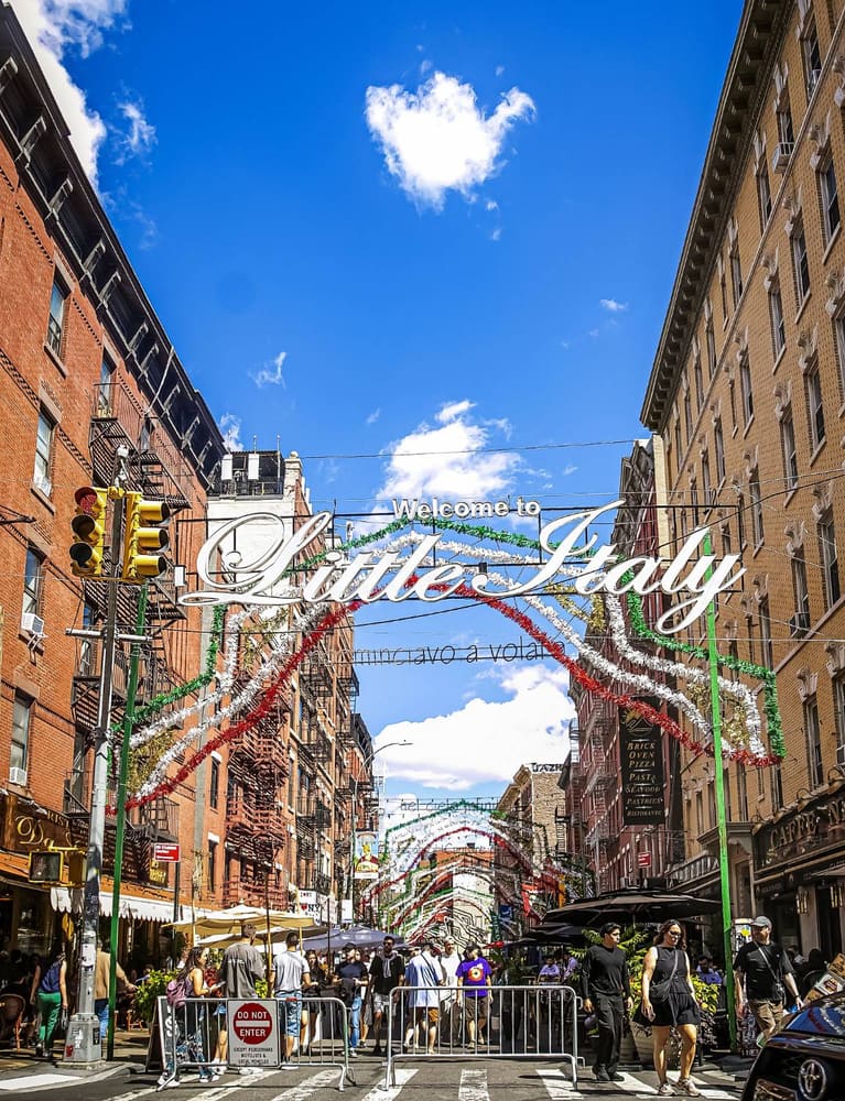 The Welcome to Little Italy archway sign over Mulberry Street, Manhattan