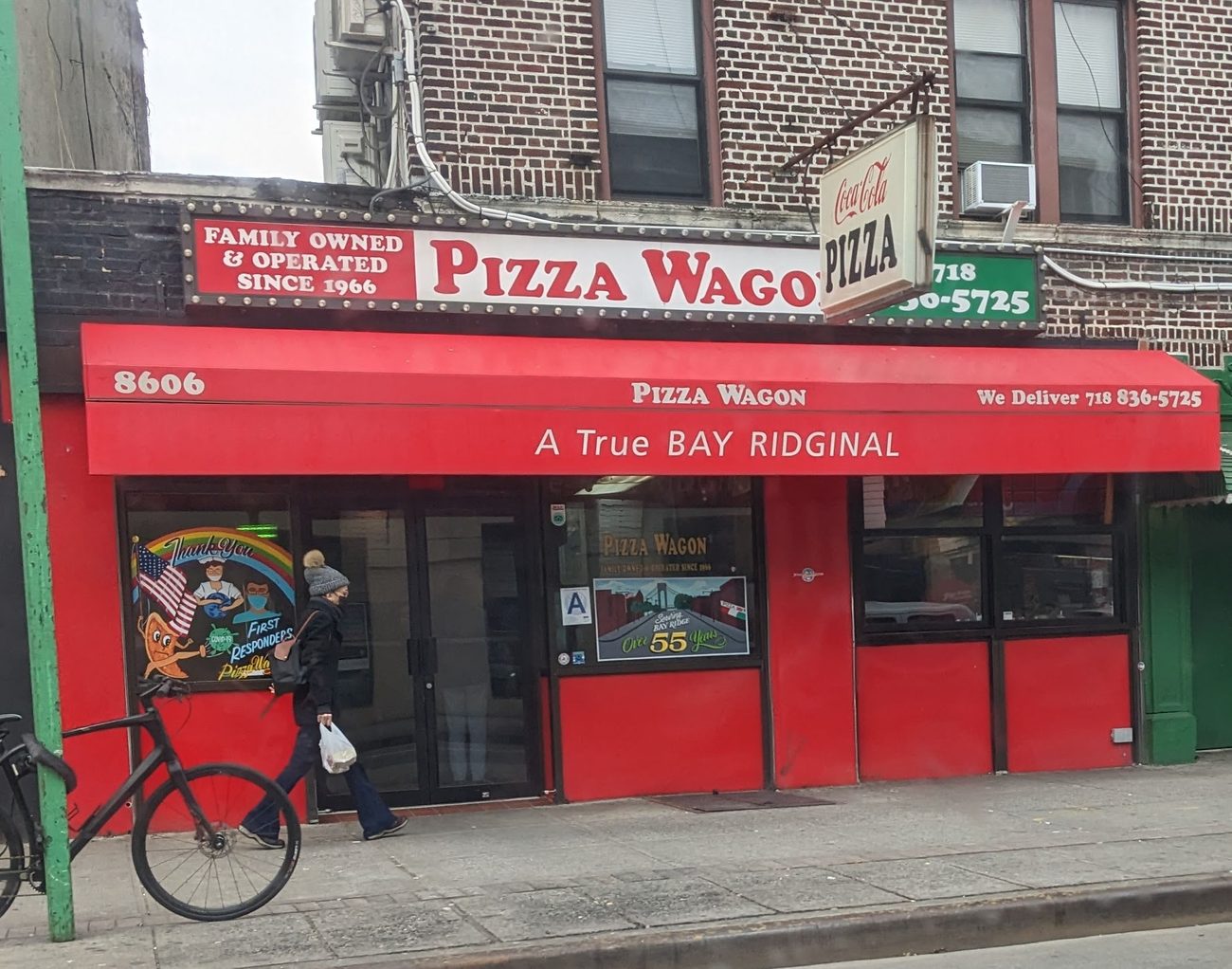 Pizza Wagon's walk-up window storefront in Bay Ridge