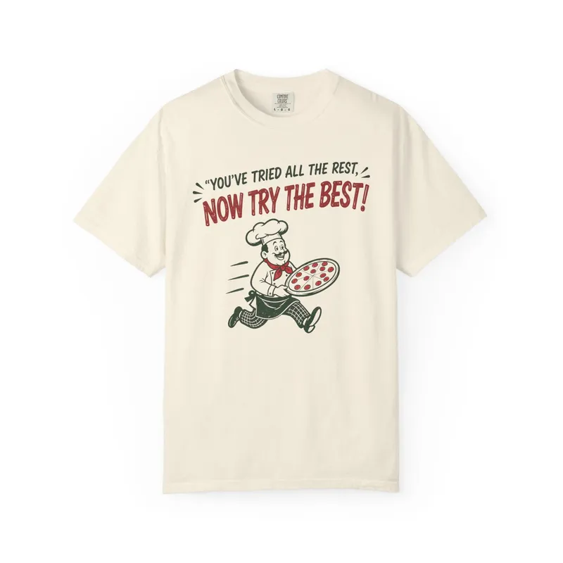 A cream t-shirt reading You’ve tried all the rest, now try the best, with a running pizza chef