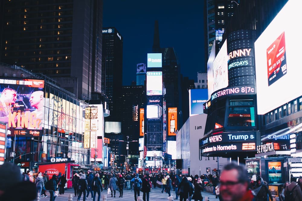 Times Square billboards and crowds at night, Manhattan